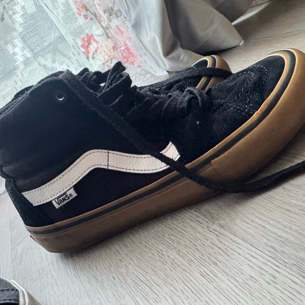 Vans Black and White High-Top Sneakers